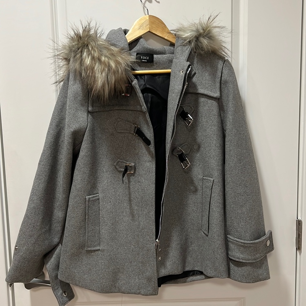 Great short pea coat with faux fur hood.